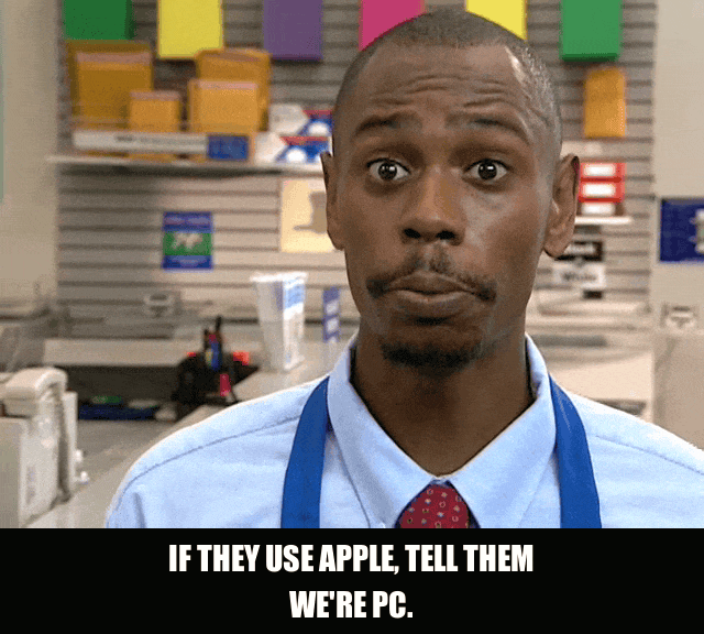 Tell Them We're PC from Chappelle's Show (2003), captioned "If they use Apple, tell them we're PC. If they use PC, tell them we're Apple.", Deadpan and Sly reaction animated GIF