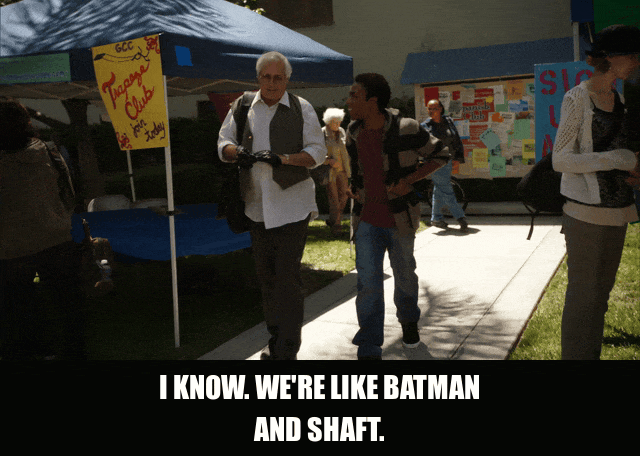 Donald Glover in Community (2009), captioned "I know. We're like Batman and Shaft.", Excited and Proud reaction animated GIF