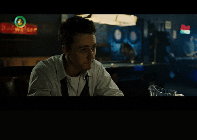 Brad Pitt in Fight Club (1999), captioned "The things you own end up owning you.", Wry and Knowing reaction animated GIF