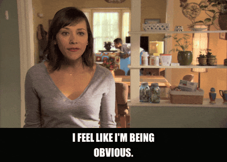 Rashida Jones in Parks and Recreation (2009), captioned "I feel like I'm being obvious.", Awkward and Self-Aware reaction animated GIF