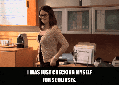 Megan Mullally in Parks and Recreation (2009), captioned "I was just checking myself for scoliosis.", Sheepish and Deadpan reaction animated GIF