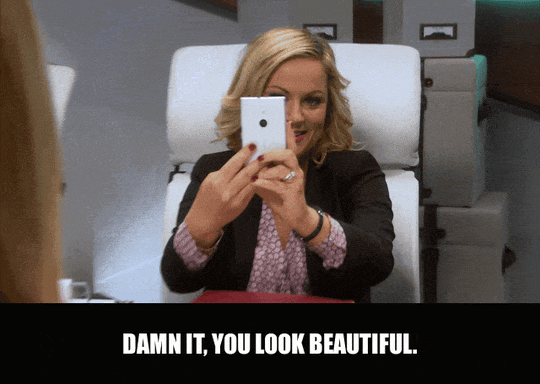 Amy Poehler in Parks and Recreation (2009), captioned "Damn it, you look beautiful.", Reluctant and Flustered reaction animated GIF
