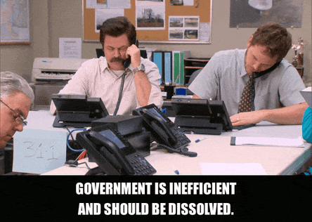 Nick Offerman in Parks and Recreation (2009), captioned "Government is inefficient and should be dissolved.", Deadpan and Satisfied reaction animated GIF