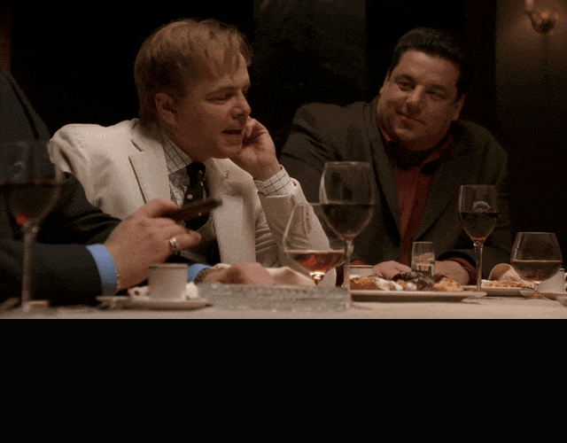 Joe Pantoliano in The Sopranos (1999), captioned "I hear Ginny Sack's getting a 95-pound mole taken off her ass.", Amused and Cruel reaction animated GIF
