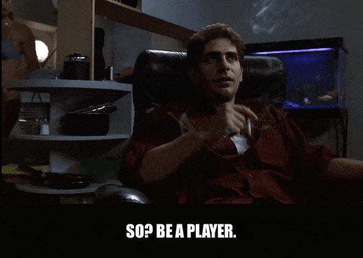 Michael Imperioli in The Sopranos (1999), captioned "So? Be a player.", Scheming and Excited reaction animated GIF