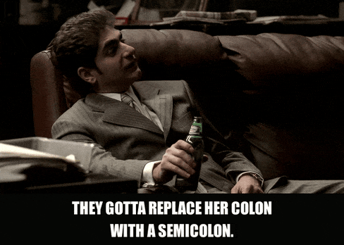 Michael Imperioli in The Sopranos (1999), captioned "They gotta replace her colon with a semicolon.", Smug and Amused reaction animated GIF