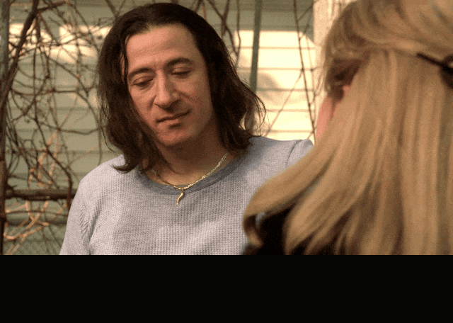 Federico Castelluccio and Edie Falco in The Sopranos (1999), captioned "It makes me very sad.", Sad and Wistful reaction animated GIF