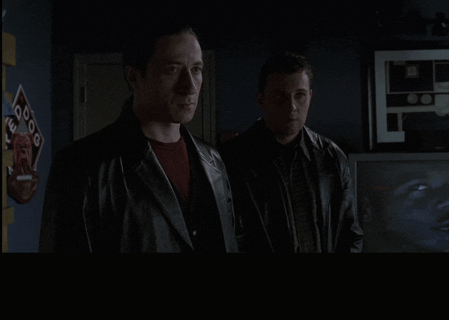Federico Castelluccio and Michael Imperioli in The Sopranos (1999), captioned "- Christopher said 10 percent. - One thousand dollars.", Deadpan and Expectant reaction animated GIF