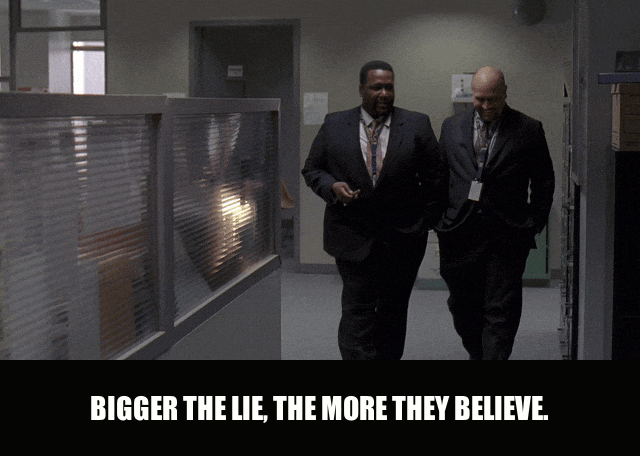 Wendell Pierce in The Wire (2002), captioned "Bigger the lie, the more they believe.", Smug and Knowing reaction animated GIF
