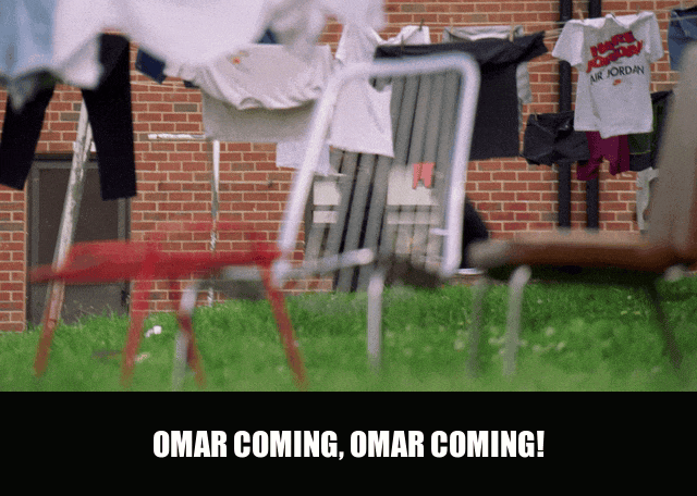Omar Coming from The Wire (2002), captioned "Omar coming, Omar coming!", Panicked and Urgent reaction animated GIF