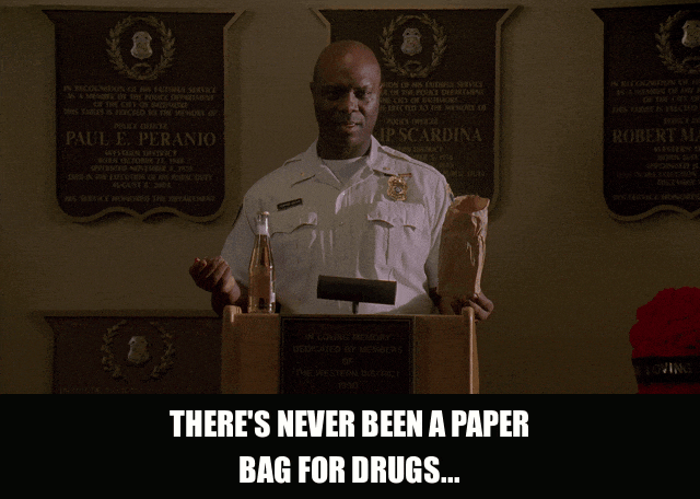 Robert Wisdom in The Wire (2002), captioned "There's never been a paper bag for drugs...", Deliberate and Wry reaction animated GIF