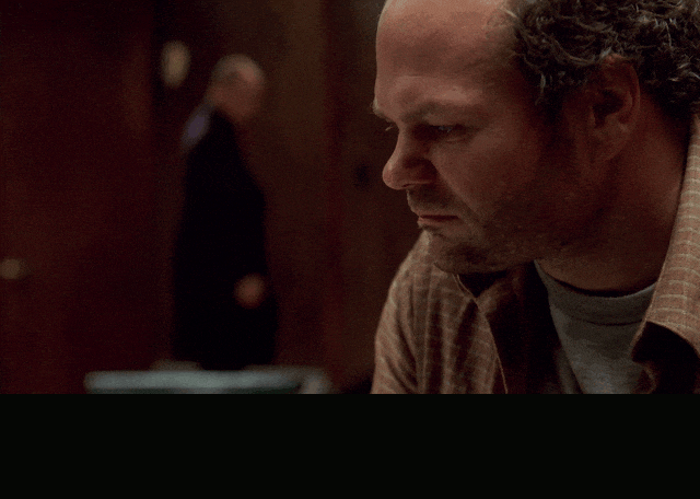 Chris Bauer in The Wire (2002), captioned "We used to make shit in this country. Build shit. Now we just put our hand in the next guy's pocket.", Bitter and Mournful reaction animated GIF