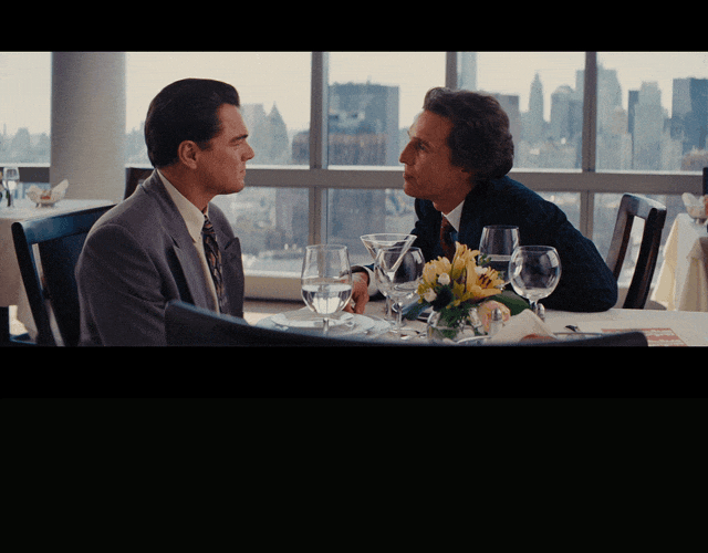 Matthew Mcconaughey in The Wolf of Wall Street (2013), captioned "Nobody knows if a stock's gonna go up, down, sideways, or in fucking circles.", Emphatic and Deadpan reaction animated GIF