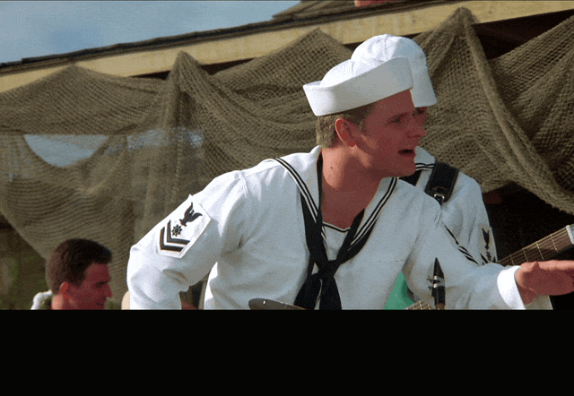 Captain Geech Stage from That Thing You Do! (1996), captioned "We're Cap'n Geech and The Shrimp Shack Shooters.", Silly and Enthusiastic reaction animated GIF